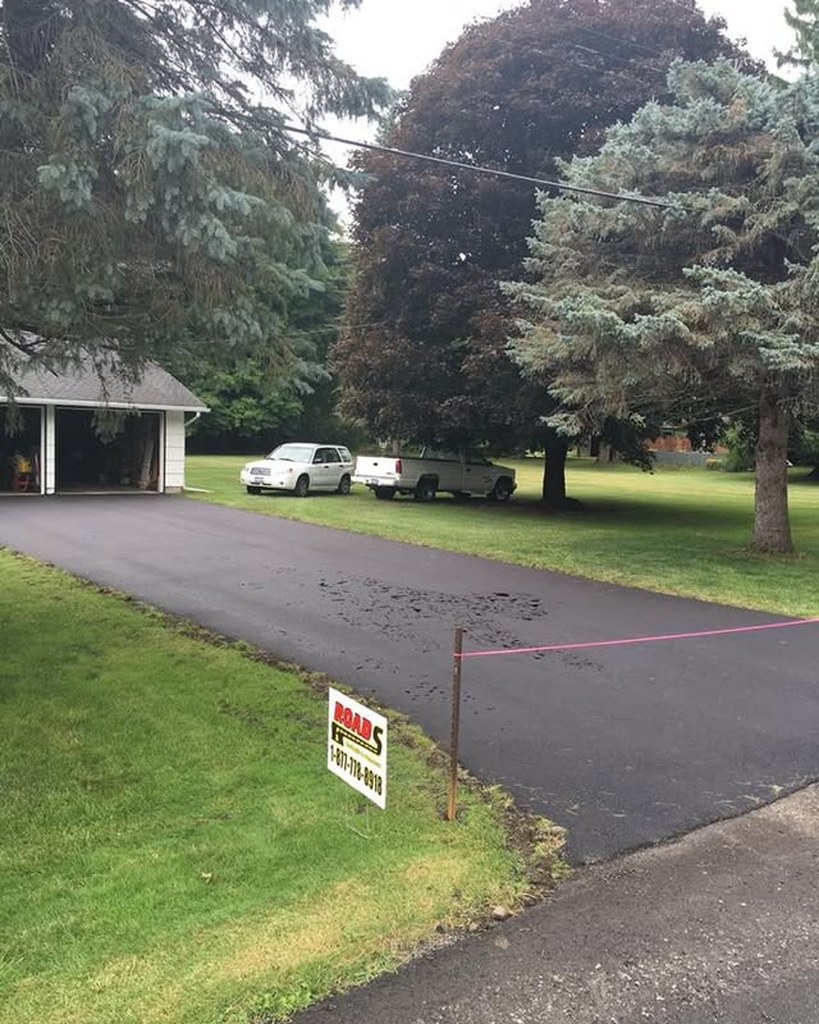 New driveway apron and asphalt surface in Erie County